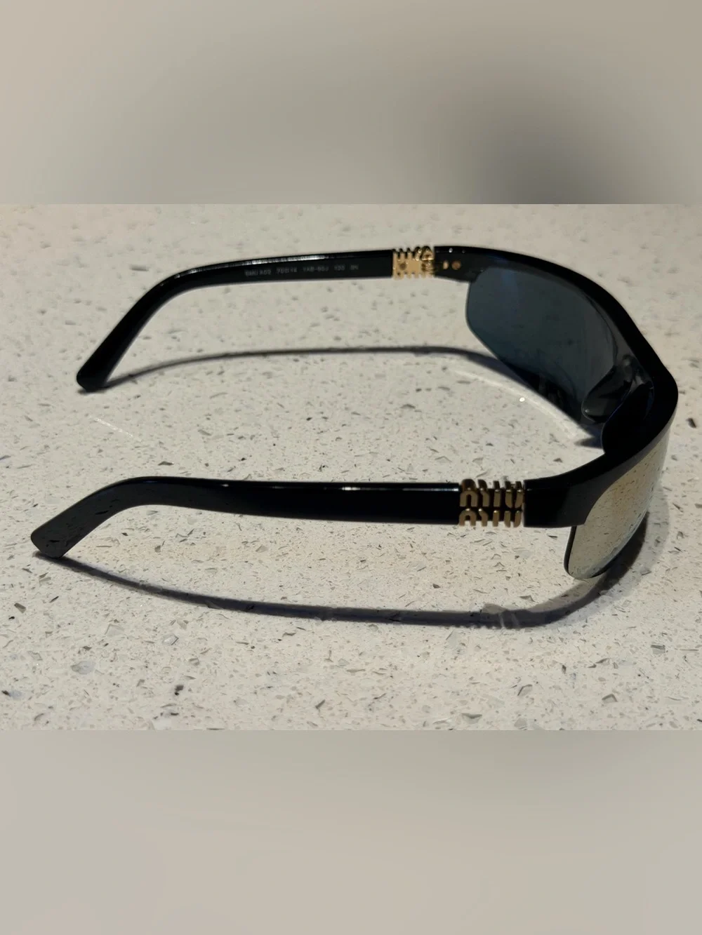 Miu Miu Black Sport Sunglasses with mirror Lenses